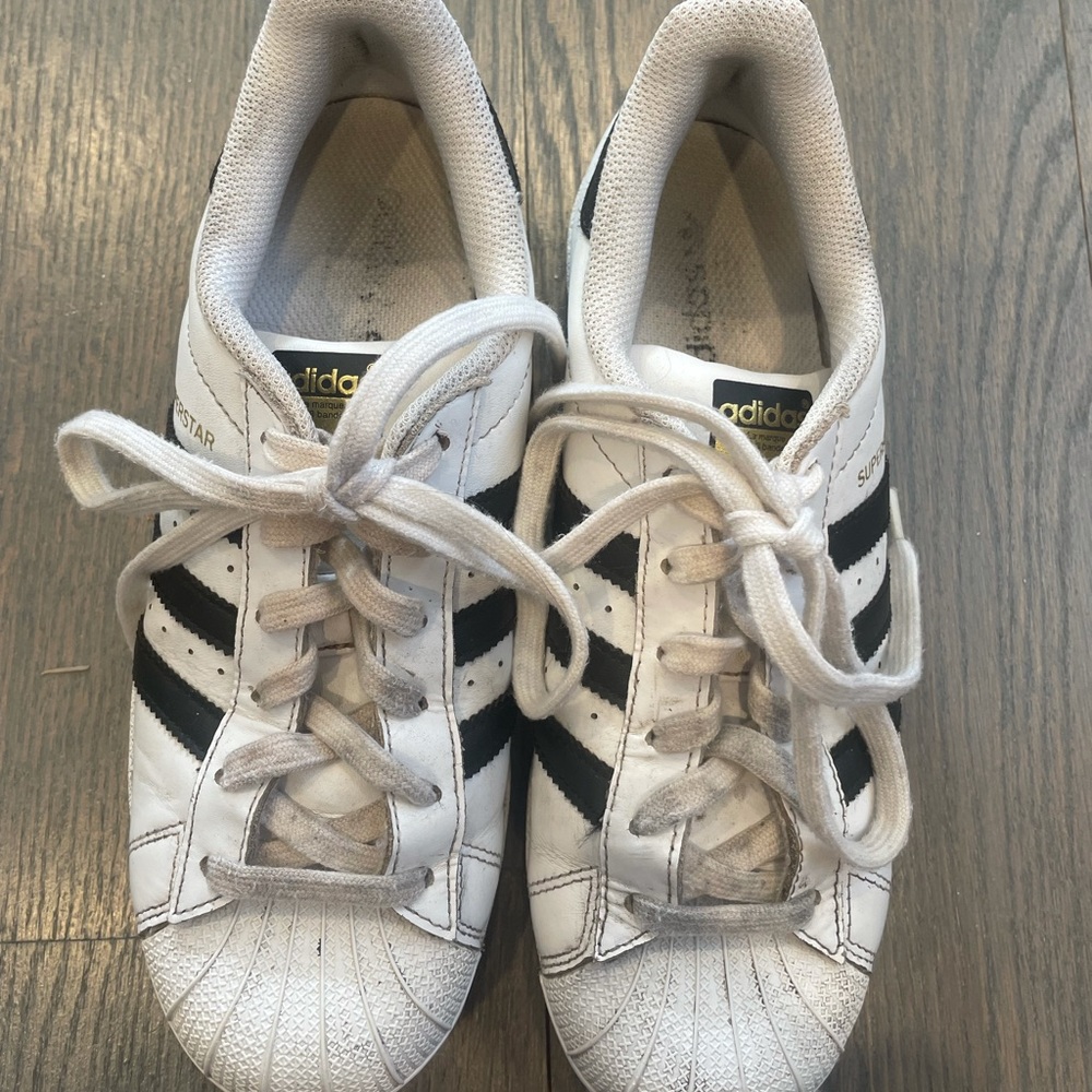 Black and White Original Adidas Superstar Sneakers.